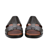Pair of brown Prestige leather sandals facing forward, highlighting the open-toe design and dual-strap construction.