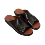 Angled top-down view of the pair showing the "Made in Italy" gold-leaf branding on the tan leather footbed.