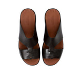 Overhead symmetrical view of the Prestige sandals highlighting the unique cut-out strap design.
