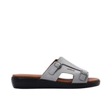 Profile view of a grey PRESTIGE leather sandal highlighting the thick black ergonomic sole and buckle detail.