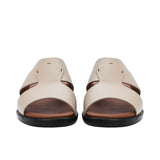 Pair of taupe Prestige leather sandals facing forward, highlighting the open-toe design and wide leather straps.