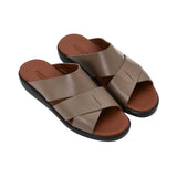 Angled top-down view of the pair showing the "Made in Italy" gold-leaf branding on the tan leather footbed.
