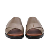 Front-facing view of a pair of taupe leather PRESTIGE sandals showing the wide criss-cross straps and open-toe design.