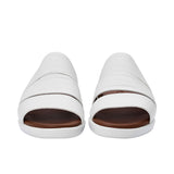 Pair of PRESTIGE sandals facing forward, highlighting the architectural triple-strap leather design.