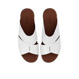 Overhead bird's-eye view of the PRESTIGE slide sandals showcasing the symmetrical criss-cross strap pattern.