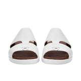 Pair of white Prestige leather sandals facing forward, highlighting the open-toe design and dual-strap construction.
