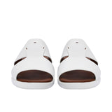 Pair of white Prestige leather sandals facing forward, highlighting the open-toe design and wide leather straps.