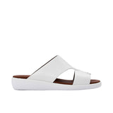 Profile shot of a WHITE leather Prestige sandal showing the thick black ergonomic sole and cognac brown footbed.