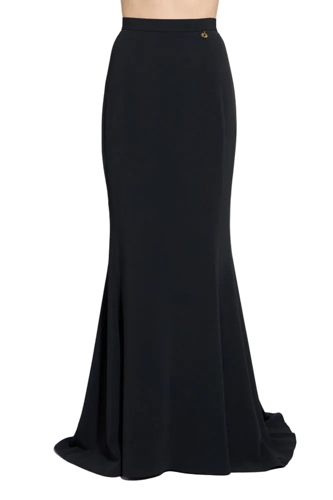 Black floor-length mermaid skirt, fitted through the hips, flaring at the hem, with a small gold-toned detail on the left wai