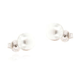 Pair of white pearl stud earrings with silver-toned posts and butterfly backs, showing a '925' hallmark.