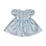 Light blue dress with silver-toned abstract swirling patterns. Features short puffed sleeves, a gathered waist, and a round b