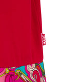 Red dress with a vibrant multi-colored abstract swirl pattern on the skirt. A pink 'PUCCI' tag is visible on the side.