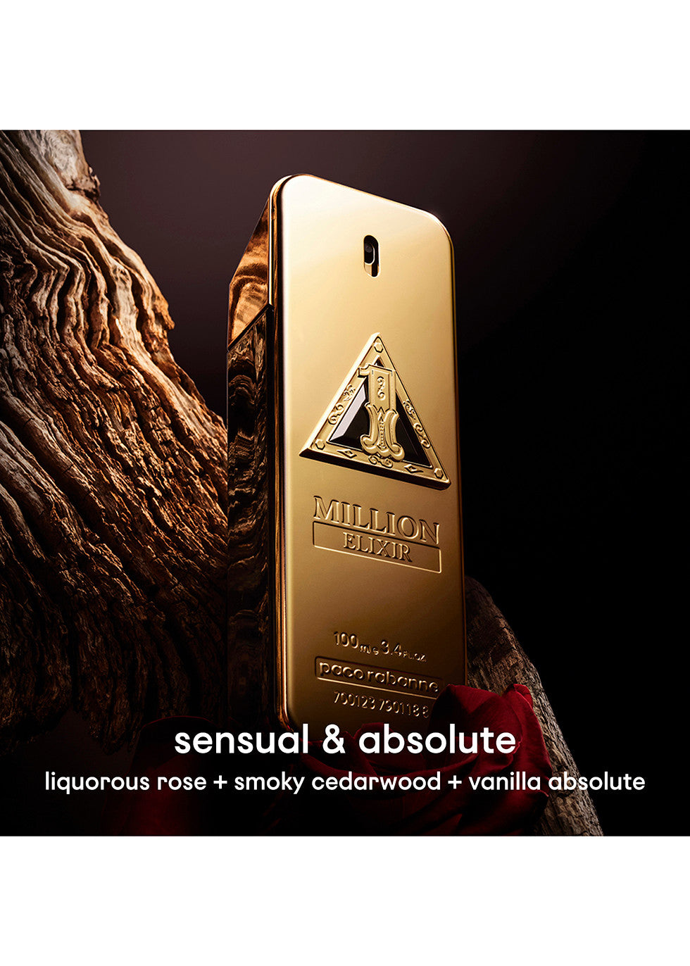 Paco Rabanne 1M Elixir Parfum Intense 100ml Gold bottle of Million Luxe perfume held by a hand against a dark background
