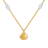 A macro studio shot focusing on the lower front of the Escada Margarete necklace, highlighting the detailed ridges of the golden scallop shell pendant and the symmetrical silver-toned stainless steel EE monogram links.
