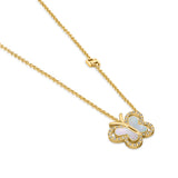 A three-quarter perspective studio shot of the butterfly necklace, showcasing the integrated gold SH monogram station along the polished cable chain.