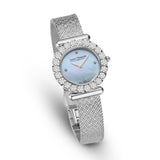 Three-quarter perspective studio view highlighting the brilliant diamond cluster bezel, the integrated silver T-bar lugs, and the fluid drape of the woven metal strap.