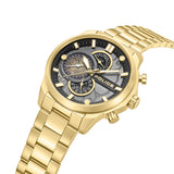 High-angle studio perspective view focusing on the polished gold bezel edge, dual plunger pushers, knurled crown, and the fluid integration of the gold steel link bracelet.
