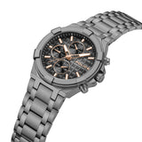 Right-angle perspective view highlighting the dual side pushers, thick integrated crown guards, architectural bezel notches, and the deep multi-layered dimension of the textured dual time subdial face.
