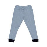 A two-piece Petit Bateau pajama set featuring light blue and white horizontal stripes with navy blue ribbed collar and cuffs.