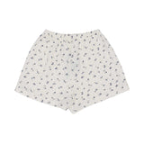 Petit Bateau girls' two-piece pajama set featuring an off-white short-sleeve t-shirt and matching shorts with a navy and pink floral print.