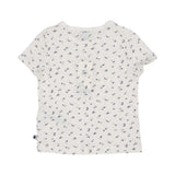 Petit Bateau girls' two-piece pajama set featuring an off-white short-sleeve t-shirt and matching shorts with a navy and pink floral print.