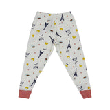 Petit Bateau kids' white two-piece pyjama set featuring a blue Eiffel Tower and yellow croissant print with red striped trim.