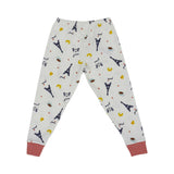 Petit Bateau kids' white two-piece pyjama set featuring a blue Eiffel Tower and yellow croissant print with red striped trim.