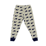 Petit Bateau children's pajama set consisting of a short-sleeve grey t-shirt and long pants, both featuring an all-over navy blue whale print with dark navy trim on the collar and cuffs.