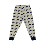 Petit Bateau children's pajama set consisting of a short-sleeve grey t-shirt and long pants, both featuring an all-over navy blue whale print with dark navy trim on the collar and cuffs.