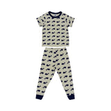 Petit Bateau children's pYjama set consisting of a short-sleeve grey t-shirt and long pants, both featuring an all-over navy blue whale print with dark navy trim on the collar and cuffs.