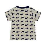 Petit Bateau children's pajama set consisting of a short-sleeve grey t-shirt and long pants, both featuring an all-over navy blue whale print with dark navy trim on the collar and cuffs.