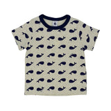 Petit Bateau children's pajama set consisting of a short-sleeve grey t-shirt and long pants, both featuring an all-over navy blue whale print with dark navy trim on the collar and cuffs.