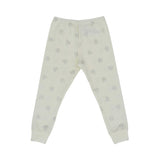 Beige-colored two-piece Petit Bateau pajama set for girls with an all-over silver glitter heart pattern and ribbed ankle and wrist cuffs.