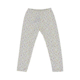 girls' two-piece white pajama set from Petit Bateau with a colorful mini-dot pattern, featuring a long-sleeve top with a gathered neckline and matching leggings.