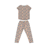 A two-piece Petit Bateau girls' pyjama set featuring a short-sleeve top and long pants with a dense coral and blue floral pattern on a white background.