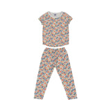 A two-piece Petit Bateau girls' pyjama set featuring a short-sleeve top and long pants with a dense coral and blue floral pattern on a white background.