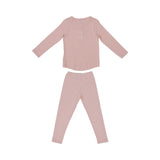 A dusty rose two-piece Petit Bateau pajama set for girls, featuring a long-sleeve top with a central floral graphic and matching long leggings.