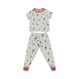 Petit Bateau kids' white two-piece pyjama set featuring a blue Eiffel Tower and yellow croissant print with red striped trim.
