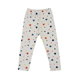 Petit Bateau kids' white two-piece pajama set with a colorful red, blue, green, and yellow heart print, featuring a short-sleeve top and long leggings.