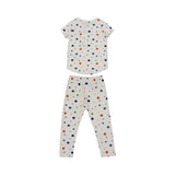 Petit Bateau kids' white two-piece pajama set with a colorful red, blue, green, and yellow heart print, featuring a short-sleeve top and long leggings.