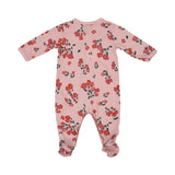 Petit Bateau baby girls' footed sleepsuit in pink with an all-over red floral print, featuring a snap-button front and a small red bow.