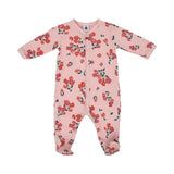 Petit Bateau baby girls' footed sleepsuit in pink with an all-over red floral print, featuring a snap-button front and a small red bow.
