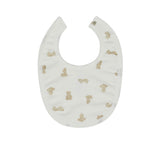 A white organic cotton baby bib from Petit Bateau featuring an all-over beige teddy bear pattern and a snap button fastener.