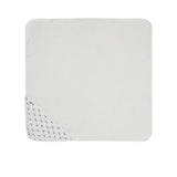 A white square hooded baby towel from Petit Bateau with a corner hood featuring a delicate navy blue whale print.