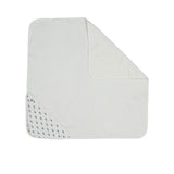 A white square hooded baby towel from Petit Bateau with a corner hood featuring a delicate navy blue whale print.