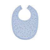 A light blue Petit Bateau baby bib with an all-over dark blue star pattern and a silver snap button closure.