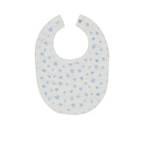 A white Petit Bateau baby bib featuring a soft all-over light blue heart pattern and a silver snap button closure.