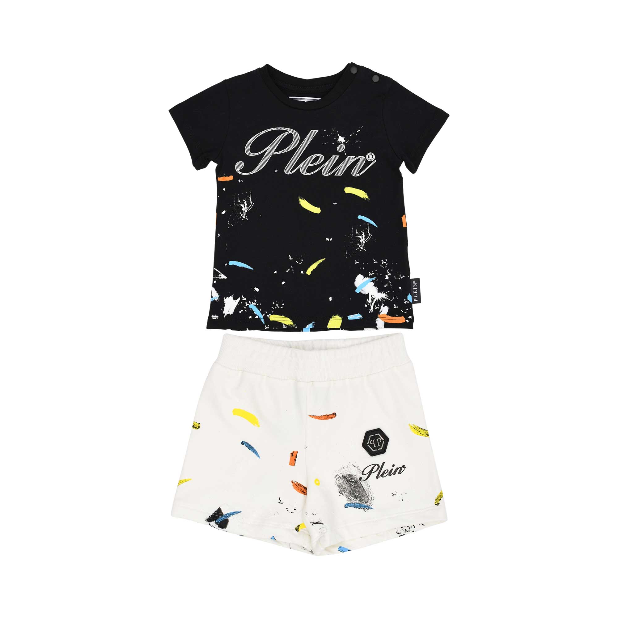 Front view of a Philipp Plein Junior set featuring a black t-shirt with a "Plein" logo and white shorts, both with multi-colored paint splatters.