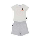 Front view of a Philipp Plein Junior set featuring a white t-shirt with orange chest branding and marl grey elasticated shorts.