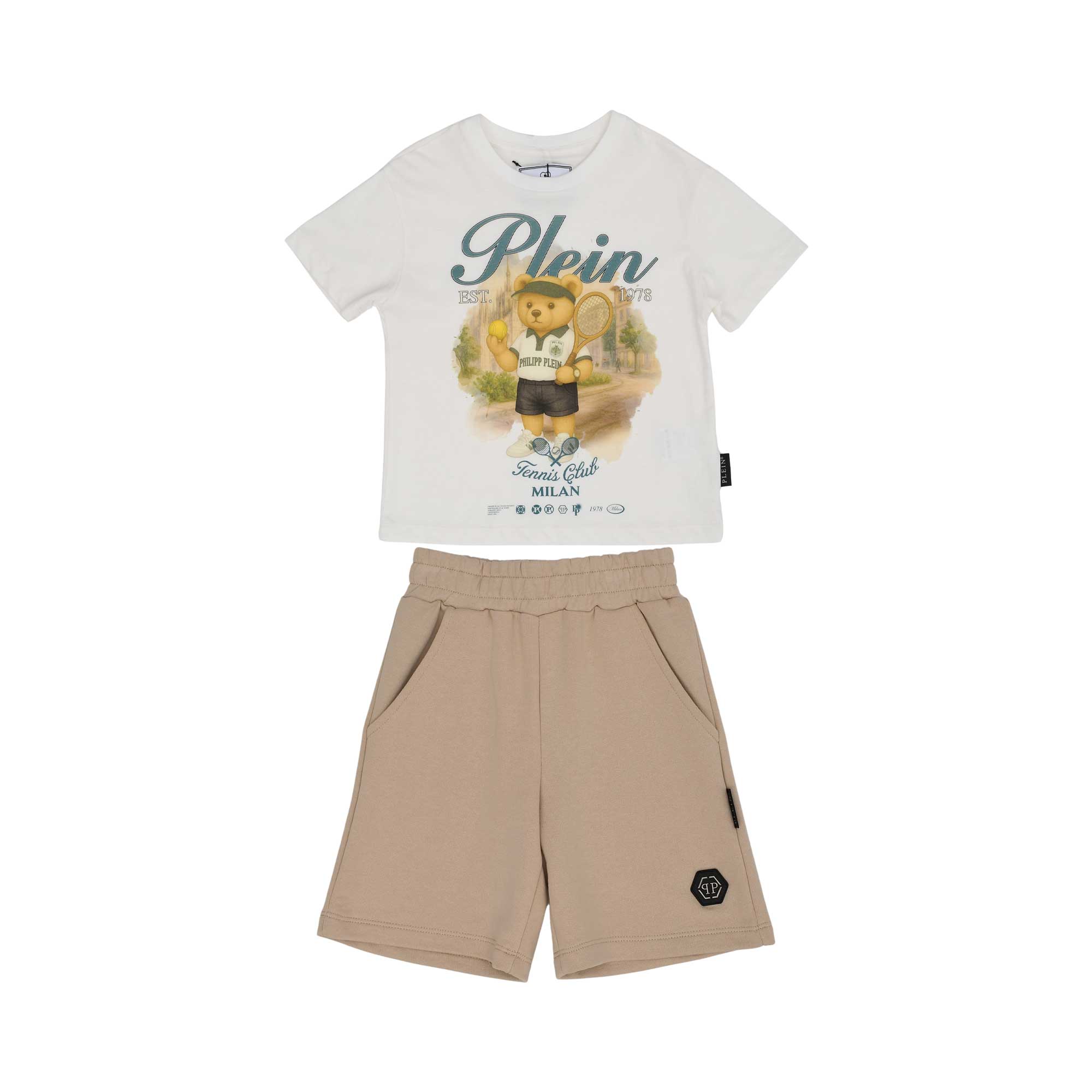 Front view of a Philipp Plein Junior set featuring a white t-shirt with a tennis bear graphic and beige shorts with a logo patch.